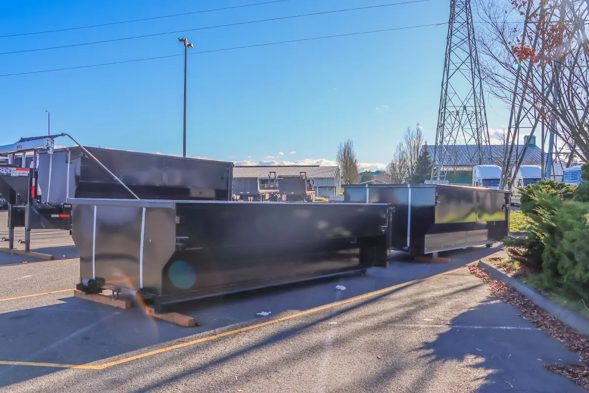 Roll-off dumpster ready for waste disposal at job site for Concrete Dumpster Rental in North Fayette
